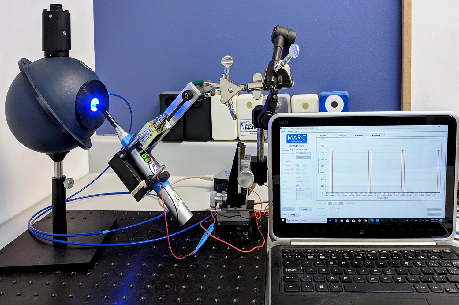 Curing light being tested in a lab.